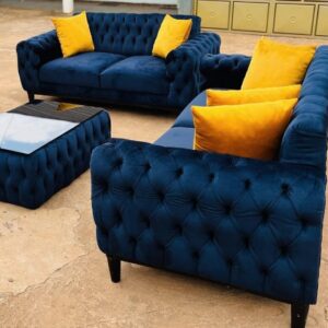 fully tufted sofa plus accent c & puff